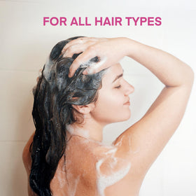 Person using Svvimer shampoo in shower showing refreshing daily cleanse