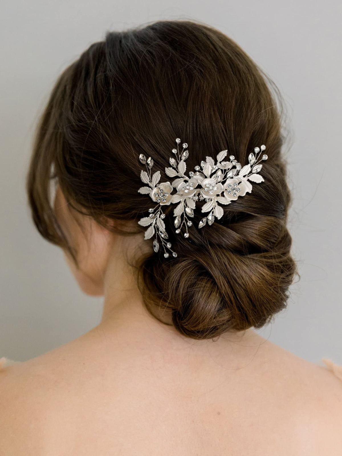 SWEETV comb placed in bridal updo demonstrating secure hold and flattering accent