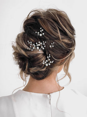 SWEETV hair pin tucked into bridal updo demonstrating secure hold and elegant accent
