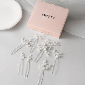 SWEETV hair pin wire being bent to show flexibility and easy shaping for custom placement