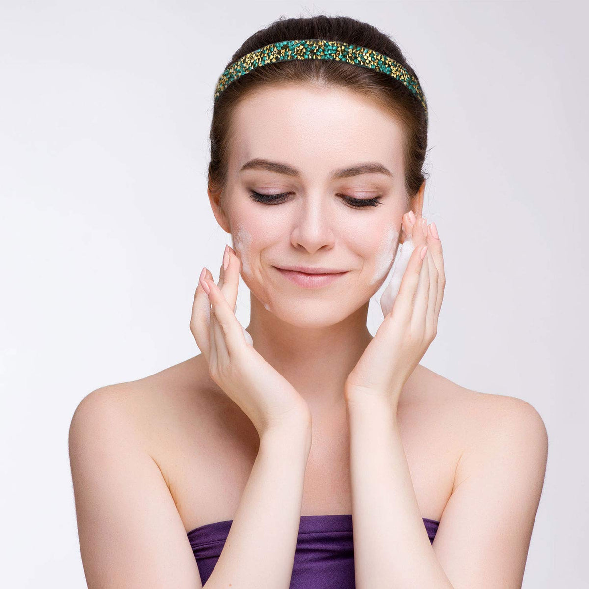 Syhood headband worn during yoga demonstrating secure non-slip hold