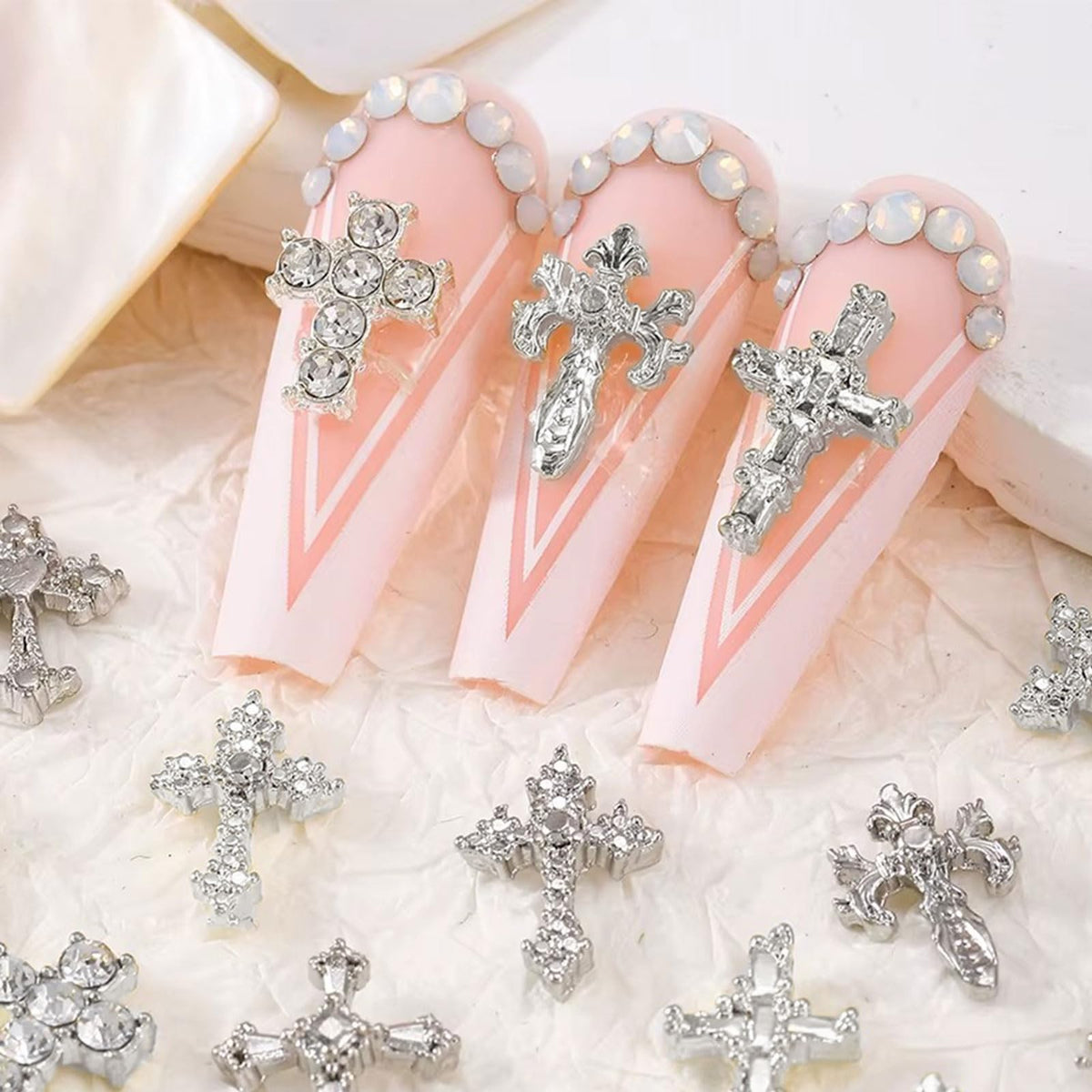 Symphonyw charms decorating a phone case showing creative craft use