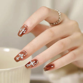 Symphonyw lifestyle display of finished manicure showing wearable elegance