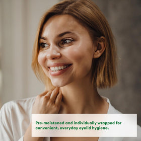 Systane wipe in hand demonstrating gentle eyelid cleansing and convenience