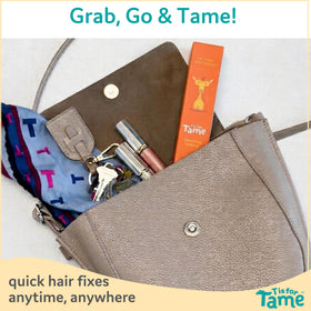 T is for Tame with coconut and jojoba to highlight nourishing oils