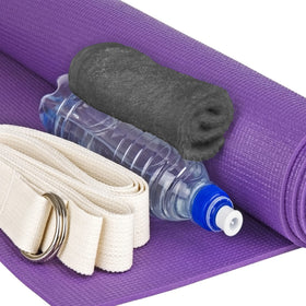 T & L neatly folded towels in storage showing space-saving stacking and organization benefit
