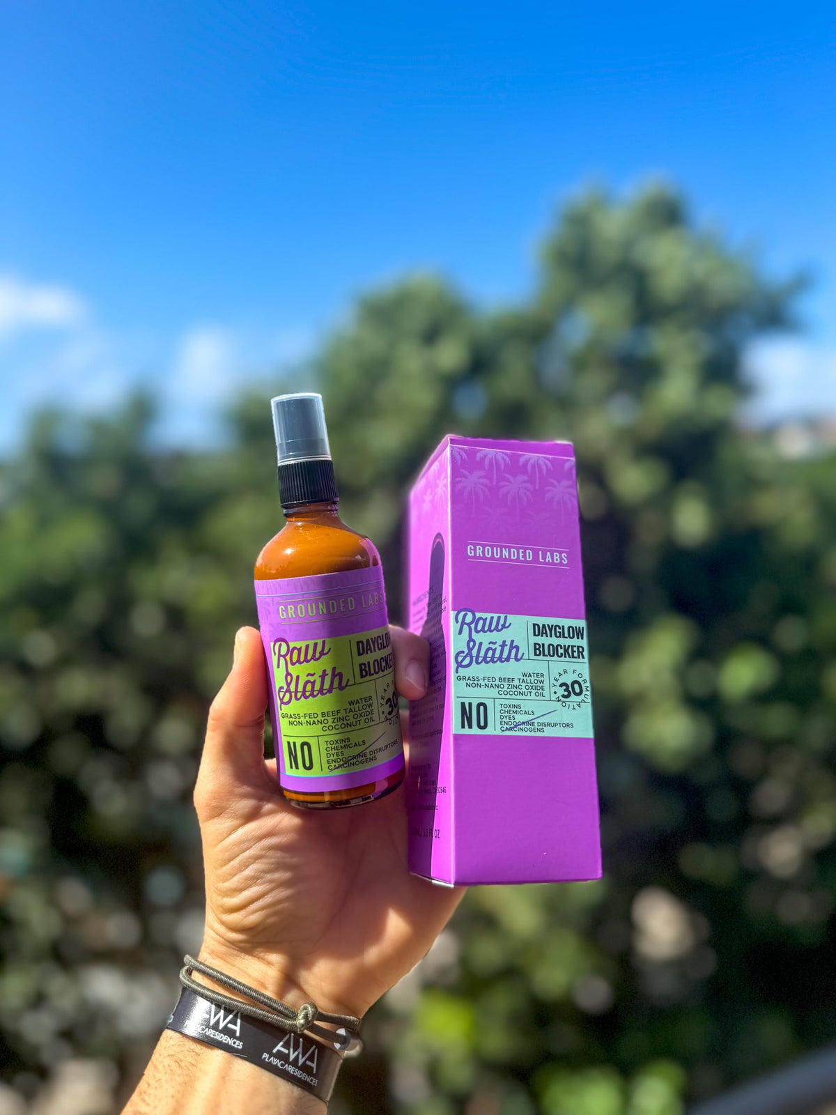 Tactilian Grounded Labs on wet skin demonstrating water resistance and lasting protection benefit