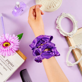Taiyin scrunchie securing ponytail in sports setting for long-lasting hold