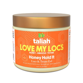 Taliah Waajid styled locs outdoors showcasing healthy shine and long-lasting hold benefit