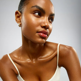 TAN-LUXE application before and after example showcasing even natural-looking glow