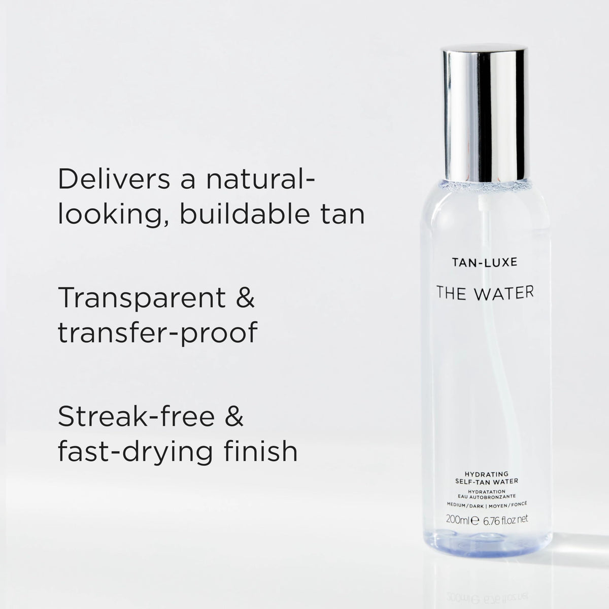 TAN-LUXE application on arm showing streak-free natural glow