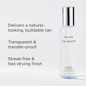 TAN-LUXE application on arm showing streak-free natural glow