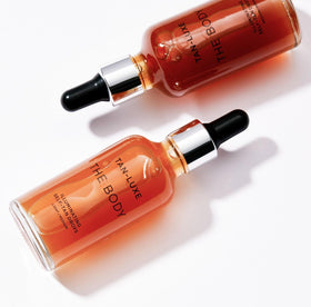 TAN-LUXE in lifestyle scene at beach-ready look delivering radiant confidence