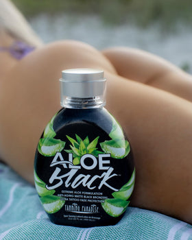 TANNING PARADISE hand applying lotion for easy blend and fast absorption