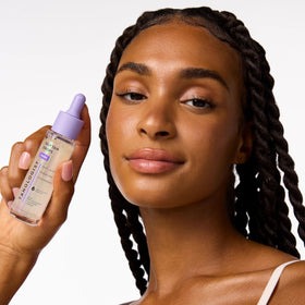 Tanologist dermatologist-tested label closeup indicating skin-safe formulation