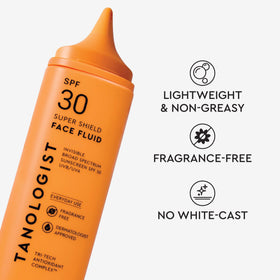 Tanologist spraying mist close-up, fine spray for even coverage