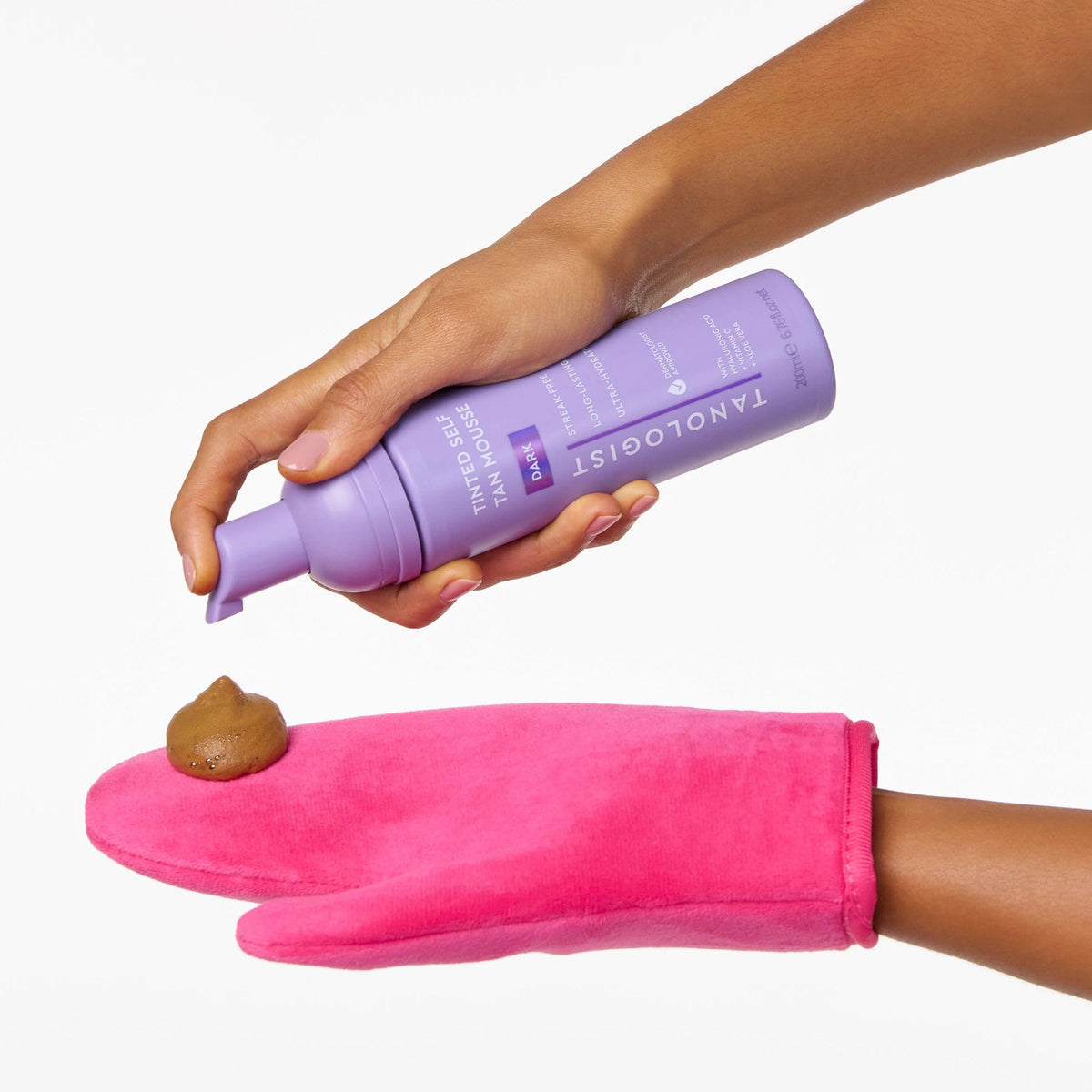 Tanologist open bottle with foam dispensed showing tinted guide color