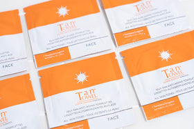 TanTowel wipe close-up texture highlighting clear, streak-free application benefit