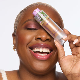 tarte applying product with sponge for seamless coverage and quick morning routine