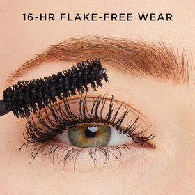 tarte big ego mascara wand beside tube illustrating brush shape for lifted lashes