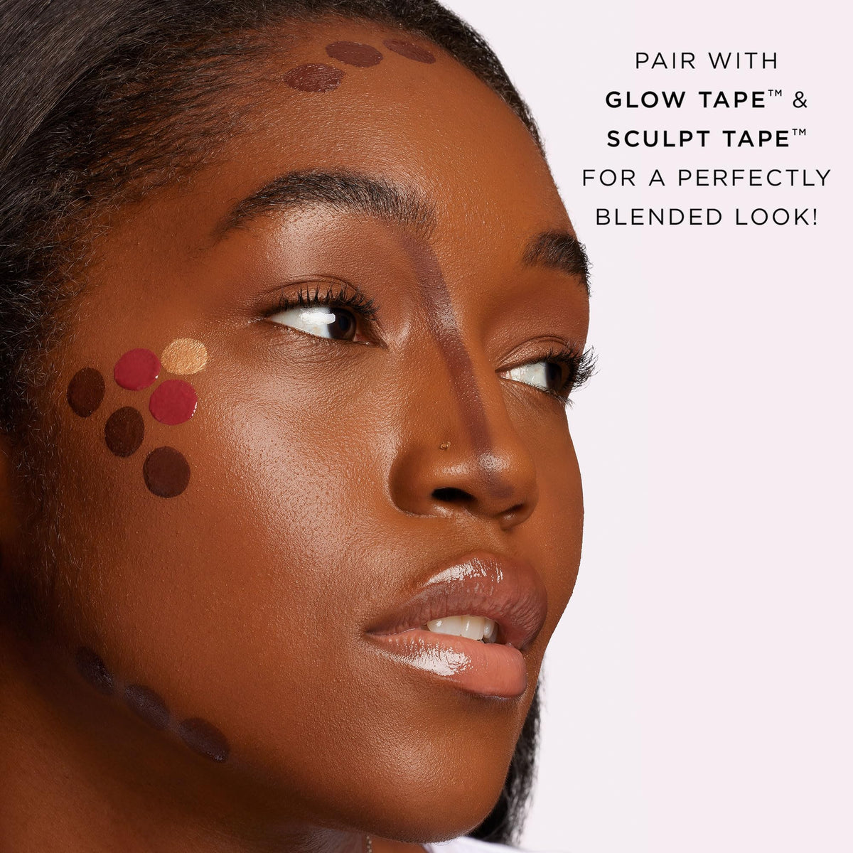 tarte blending blush with a brush to build color without streaks