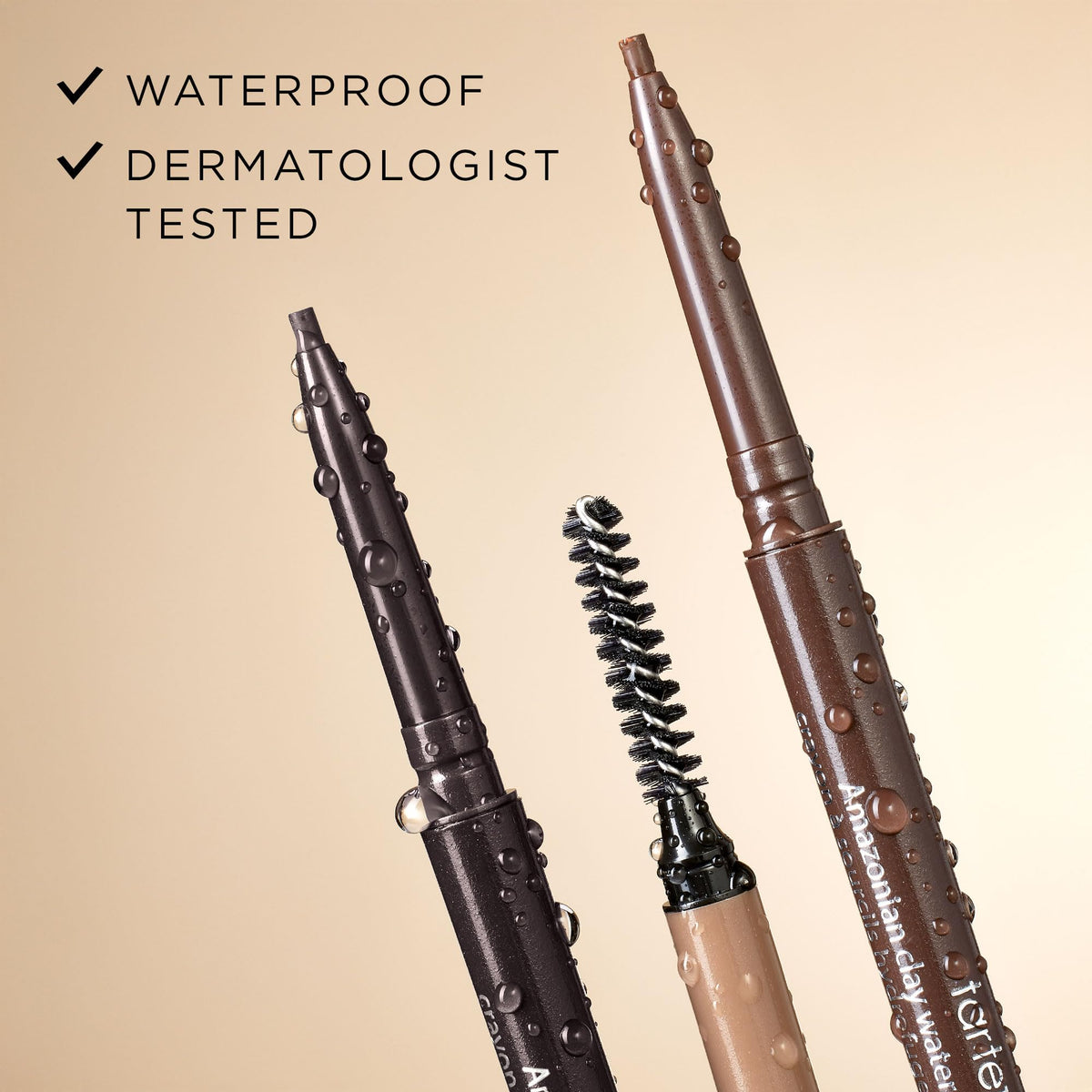 tarte brow pencil held in hand for size comparison and precise control benefit