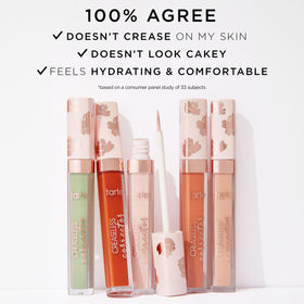 model applying tarte creaseless corrector under eye to neutralize dark circles and brighten appearance