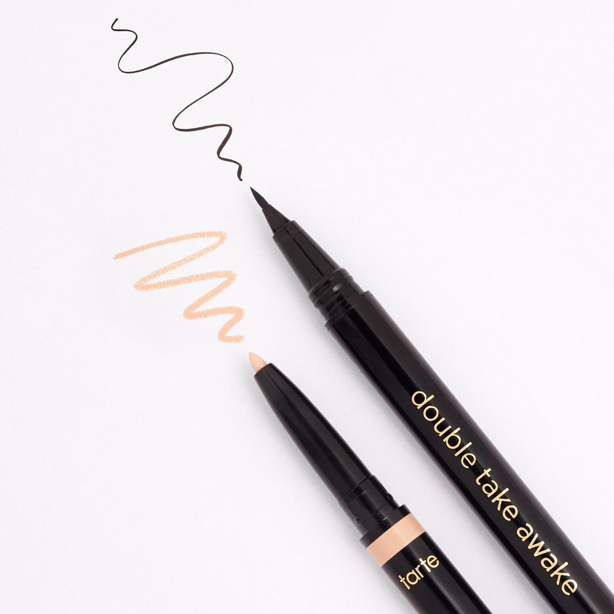 tarte eyeliner in use along lashline, creates wider awake eyes benefit
