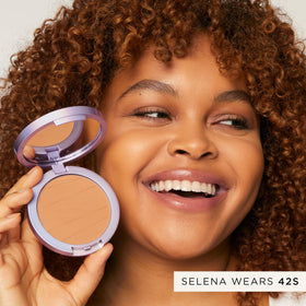 tarte powder applied on model t-zone reducing shine and blurring pores