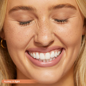 tarte close-up of five-pronged applicator highlighting precise, even freckle placement