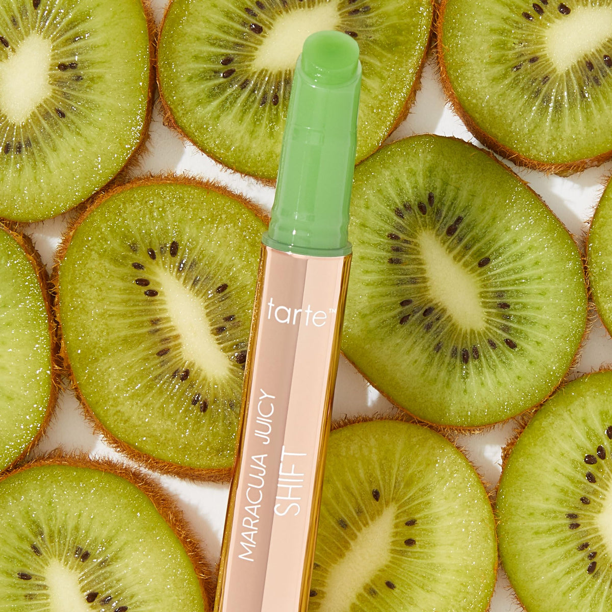 tarte lifestyle woman smiling wearing gloss-balm, showing hydrated, fuller-looking lips