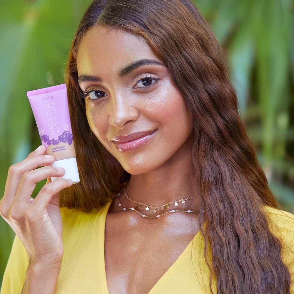 tarte maracuja oil bottle beside product, highlights natural superfruit nourishment