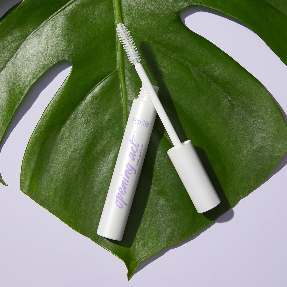 tarte white-tinted primer texture on back of hand showing coverage benefit