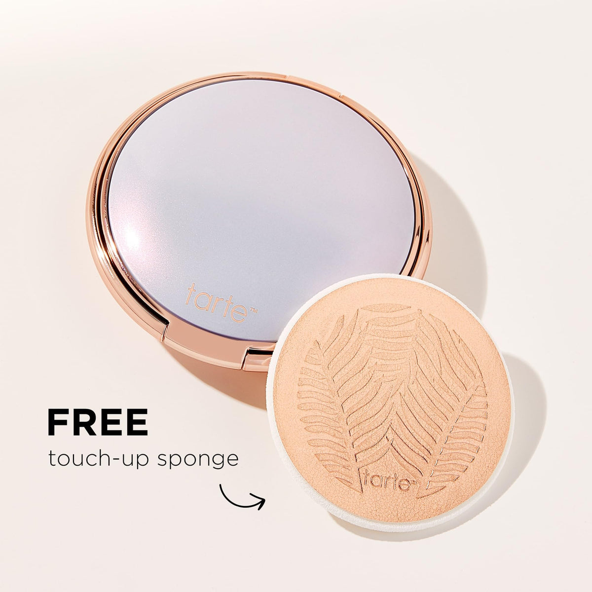tarte shade 27S light-medium sand swatched on arm for true color match