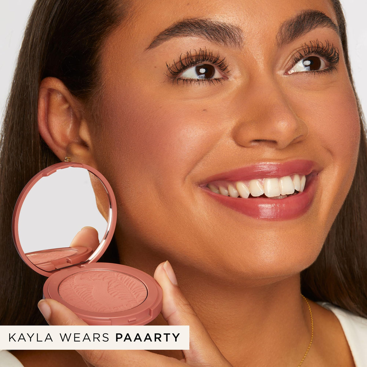 tarte swatch on skin showing buildable color payoff and seamless blend