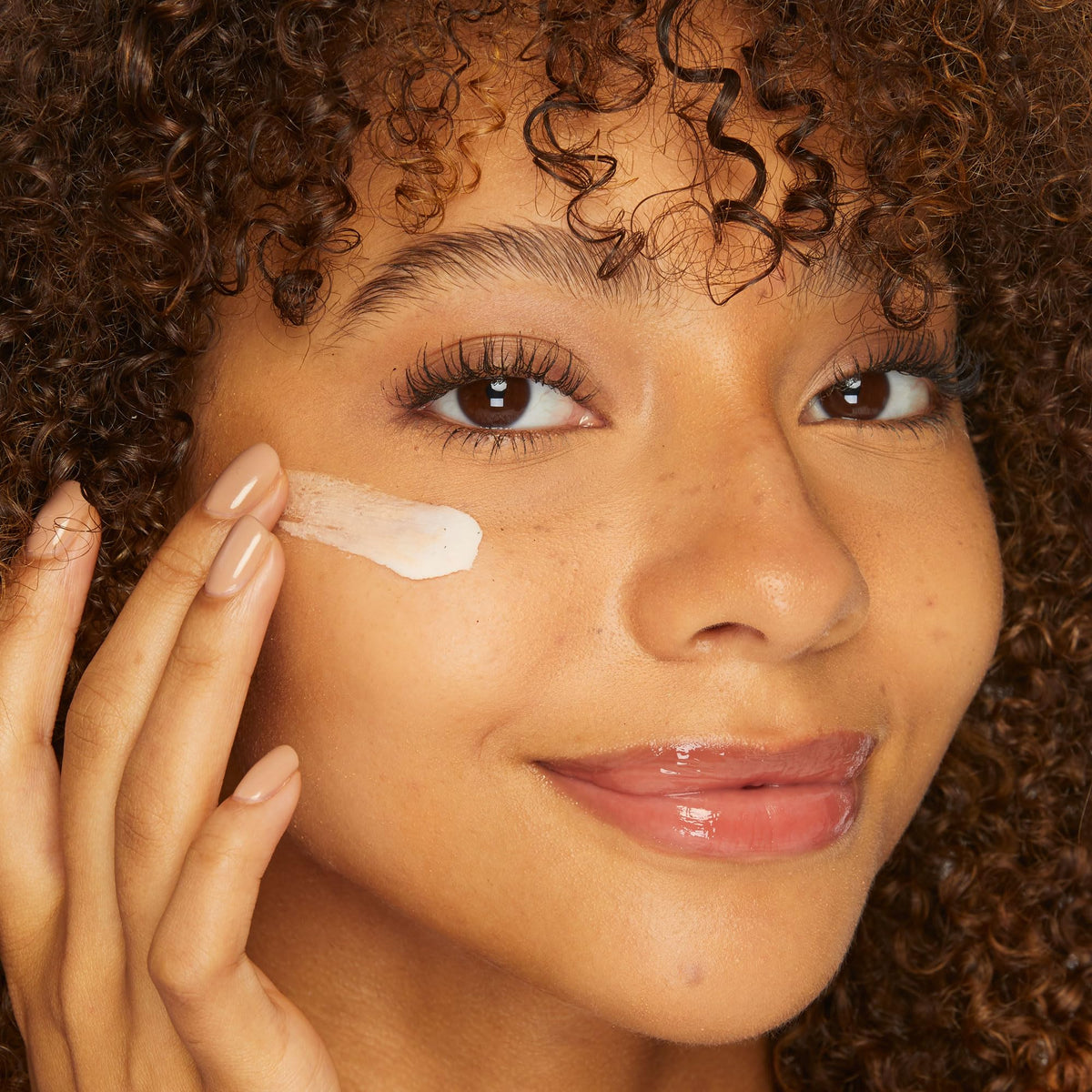 tarte timeless primer applied to skin in lifestyle setting for a natural perfected look