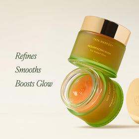 Tata Harper open jar top view revealing translucent exfoliating gel