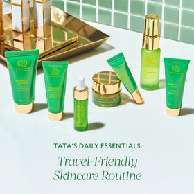 Tata Harper serum dropper dispensing product showcasing concentrated radiance