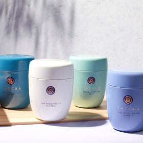 TATCHA jar on bathroom shelf in serene setting, suggesting calming ritual benefits