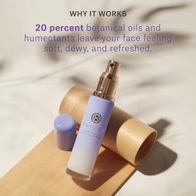 Hand applying TATCHA mist indicating quick absorption and glow
