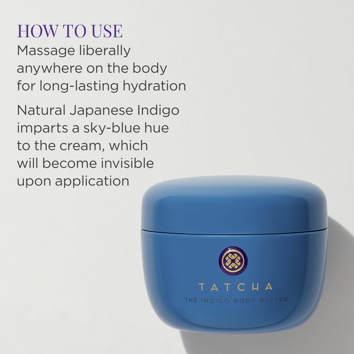TATCHA indigo body butter next to hand to show jar size and travel-friendly quantity