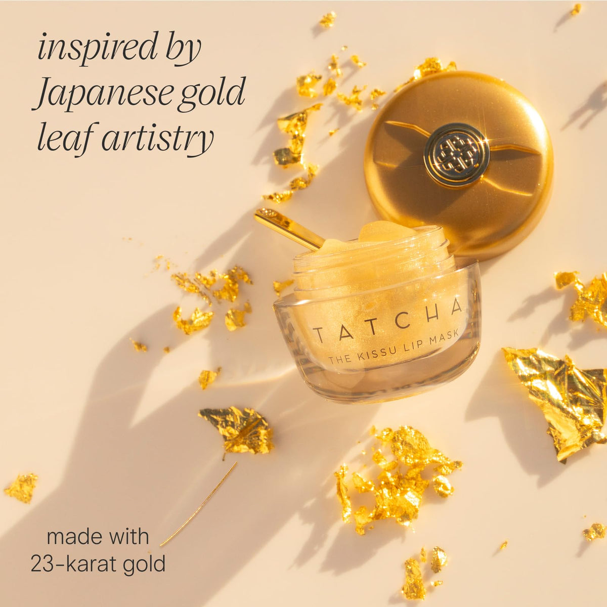 TATCHA Kissu next to a coin to show size and portability benefit