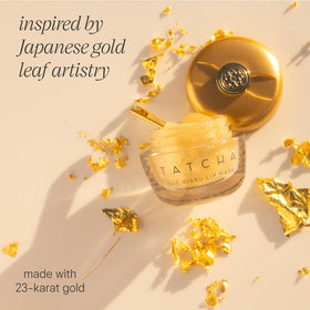 TATCHA Kissu next to a coin to show size and portability benefit