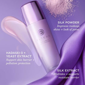 TATCHA bottle in a makeup bag lifestyle shot showing everyday convenience