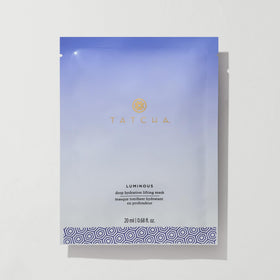 TATCHA front pouch showing product branding and single-use mask benefit