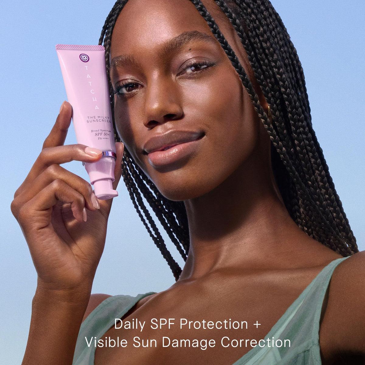 TATCHA Milky Sunscreen dispensing pump demonstrating convenient hygienic use