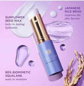 TATCHA serum stick next to coin for size comparison showing portable convenience benefit