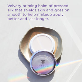 TATCHA primer being swirled to show creamy-to-silk transformation for easy spread