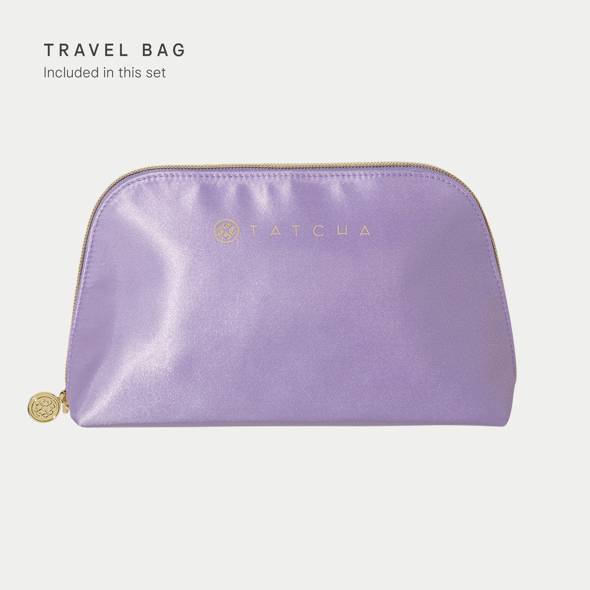 TATCHA travel kit inside a suitcase showing TSA-friendly travel benefit