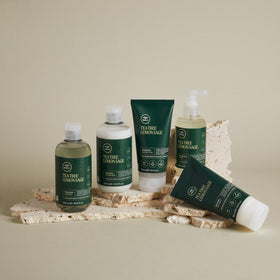 Tea Tree lemon and sage still life illustrating citrus-herbal scent uplift